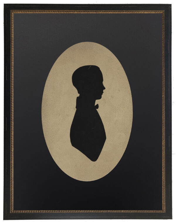 Vintage black male silhouette on a distressed background with a black oval mat