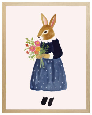 Dressed bunny with a flower bouquet